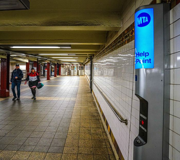 'Point'-less: Over 1,000 emergency calls went unanswered through MTA 'Help Points' subway intercoms, report finds 3 People walking in a subway station next to a NYC subway intercom system kiosk