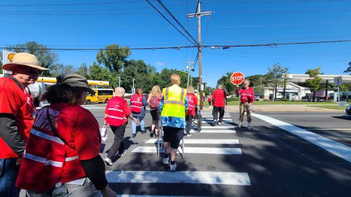 Paving the way: AARP New York launching hands-on sidewalk survey to improve pedestrian safety in NYC 8 people walking across a crosswalk