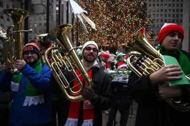 Tuba Christmas rings in holiday cheer at Rockefeller Center 29 tuba players at tuba christmas in rockefeller center