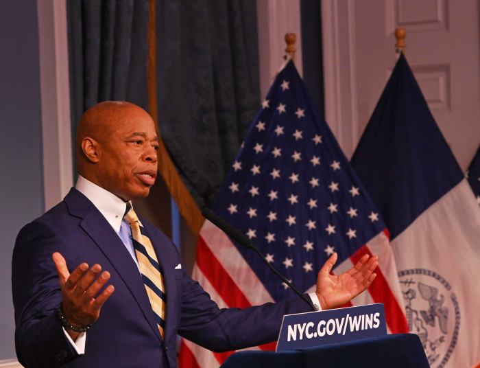 After meeting with Trump border czar, Mayor Adams says he'll seek dual approach to protect NYC immigrants and expel violent criminals 2 Mayor Adams throws his hands in the air when addressing his stance on immigration after meeting with Homan.