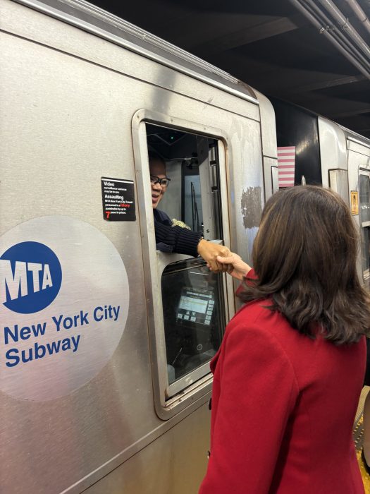 EXCLUSIVE | Governor Hochul talks subway security while riding the M train with amNewYork Metro 5 Governor Hochul greets train conductor.