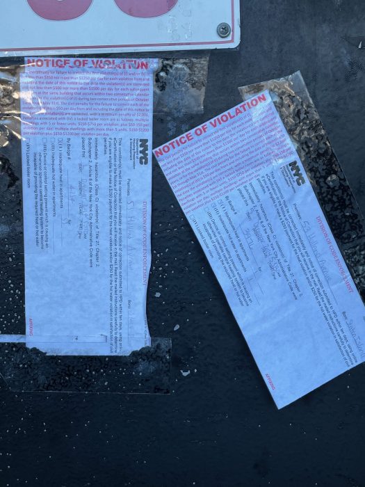 Seniors, families living with no heat for over a week in subsidized apartment complex on Staten Island 2 violation notices on the door of a housing complex in Staten Island