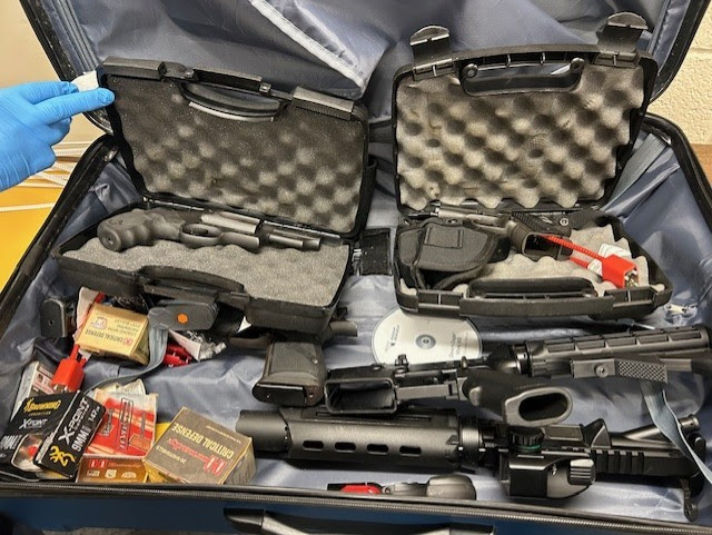 Guns, parts, and ammunition Seized from Moore’s apartment.