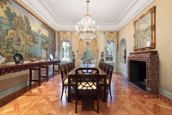 PHOTOS: Real estate magnate's $15 million home on Manhattan's Upper East Side hits the market 2 table under a crystal chandelier inside a luxury residence on Manhattan's Upper East Side