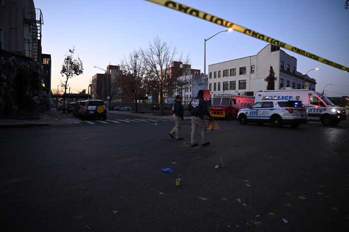 Man in Brooklyn fighting for life after being shot near restaurant: cops 2 Police at Brooklyn scene where man was shot