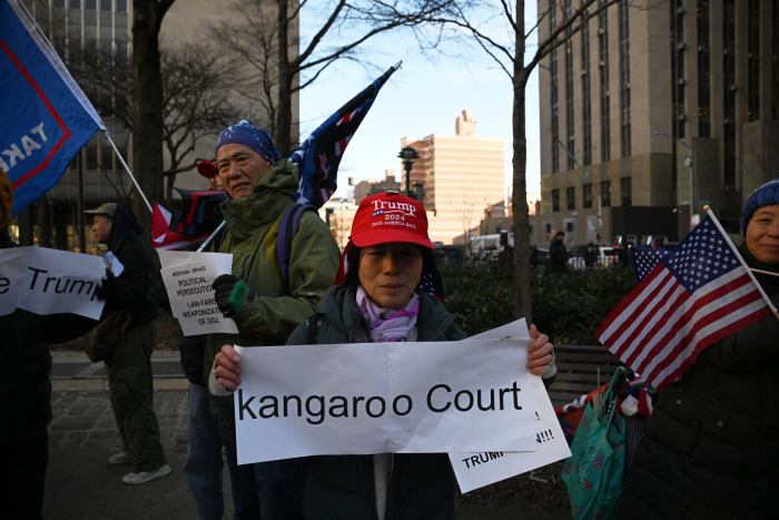 Judge rules President-elect Trump will face no punishment in hush money case 3 The unwavering fans stood proud with MAGA apparel, flags brandishing Trumps face and signs pointing towards his alleged innocence as news of the judge's decision spread.