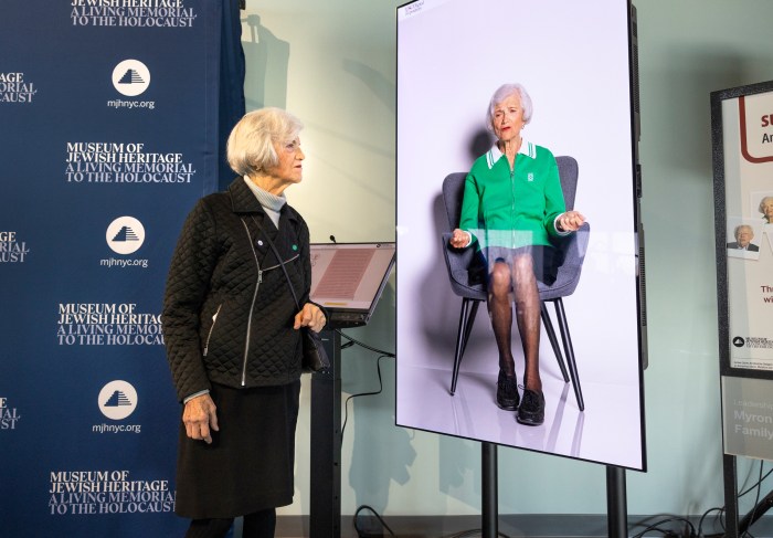 Holocaust Remembrance Day memorial event in Manhattan brings 200 survivors together, 80 years later: 'I still feel the pain of it' 3 Levy poses next to her video on the newly launched 'Survivor Stories: An Interactive Dialog'.