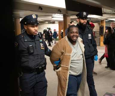 Manhattan subway attack: Deranged man says voices in his head made him push woman into moving train 42 Manhattan subway attack suspect arrested and smiling for pushing woman into moving train