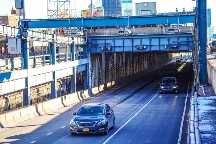 Congestion pricing: Traffic still decreasing, MTA says — but they're still crunching the revenue numbers 3 Cars pass under the toll gantries at the Manhattan Bridge amid congestion pricing in New York on Jan. 7, 2025.