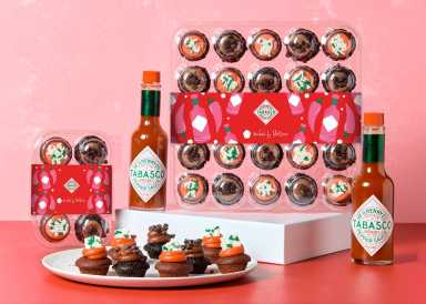 Baked By Melissa teams up with TABASCO for spicy Valentine's Day cupcake collaboration 17 Baked By Melissa cupcakes stacked with tabasco sauce