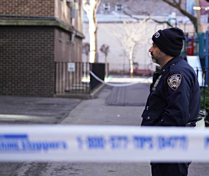 Bloodshed in the Bronx: Two women stabbed, male suspect at large in deadly domestic dispute 2 A police officer at a crime scene in Harlem.