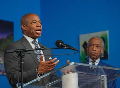 Mayor Eric Adams (left) and Rev. Al Sharpton (right).