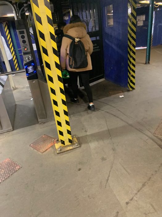 Fare evasion runs rampant at this Queens subway station even as number of cheaters drop 3 People walking through automated gates in a Queens subway station.