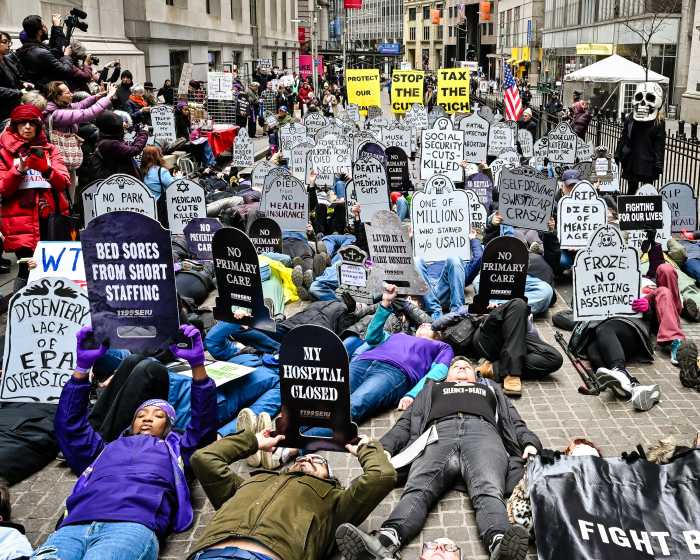 Manhattan march sees thousands enraged by Medicaid cuts and federal layoffs: 'They're killing people' 5 Protesters in Manhattan stage a die-in against Musk and Trump federal cuts