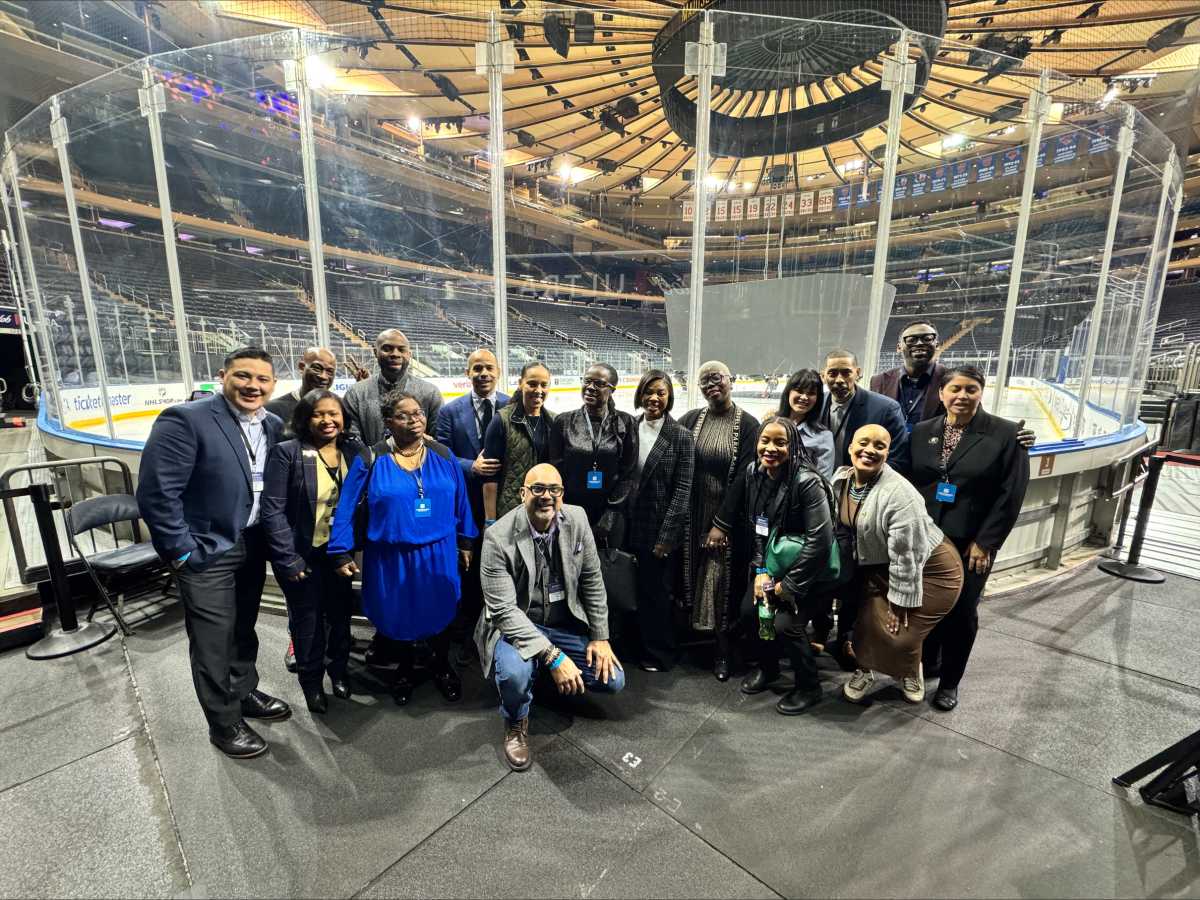 People posed ay madison square garden rookie program event