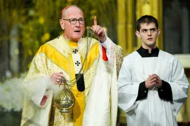 Cardinal Dolan with incense during Easter mass a day before Pope Francis' death