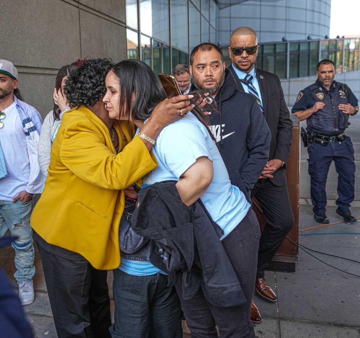 Bronx DA Darcel Clark embraces mother of Kyhara Tay following sentencing of killers