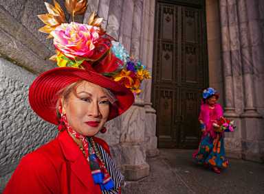 Woman in colorful Easter hat during parade in Midtown