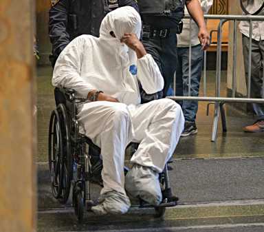 Gunman who allegedly started Harlem shootout that killed grandmother hides face from media at court 29 DSC07347-2