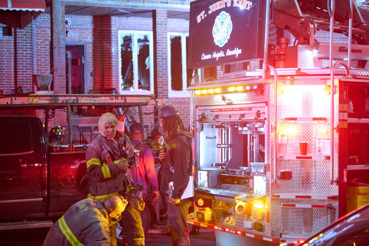 FDNY marshals investigating pair of Brooklyn fires 2 Firefighters work to remove windows from a second floor during a fire at 1585 Carroll St. in Brooklyn on April 4, 2025.
