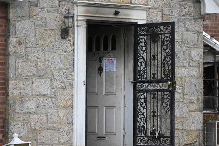 Easter tragedy: Fatal two-alarm fire rips through Queens home, killing three people 3 door of a house that was destroyed by fire