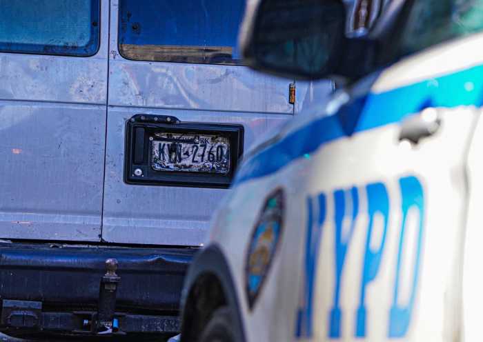 Dirty license plates in NYC must be cleaned and cleared starting April 16 — or else 3 Van with dirty license plates stopped by NYPD car in NYC