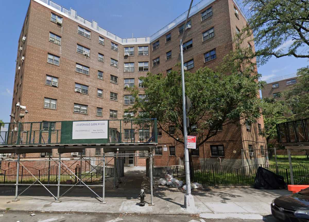 Man shot in leg at Queens housing complex: cops 2 Scene of Queens shooting; big apartment building on street