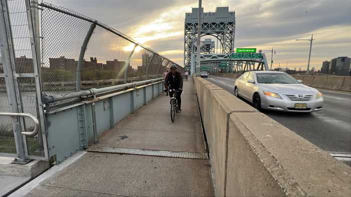 MTA opens a 'biker's paradise' on RFK-Triborough Bridge 5 man on a bike path riding a bike