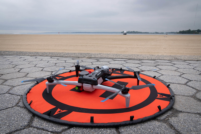 Drones like this one, pictured at Orchard Beach on May 24, 2025, will be equipped with flotation devices to assist swimmers in distress as part the city’s summer safety plan.