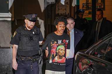 Times Square shooting suspect escorted by cops during perp walk
