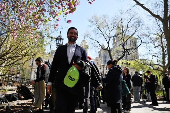 Mayoral candidate Zohran Mamdani with tenants who support rent freeze