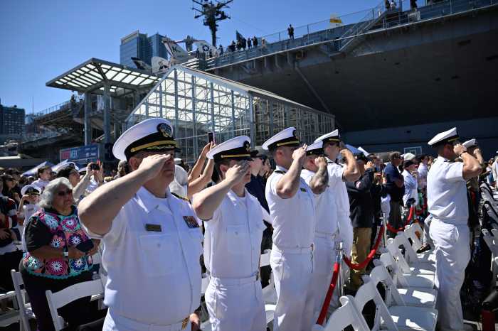 Memorial Day 2025: Intrepid Museum's service pays homage to generations of American freedom-fighters 4 Navy members salute on Memorial Day at the Intrepid Sea Air and Space Museum