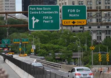 roads and street signs in Manhattan during congestion pricing
