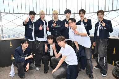 xikers at the top of the Empire State Building