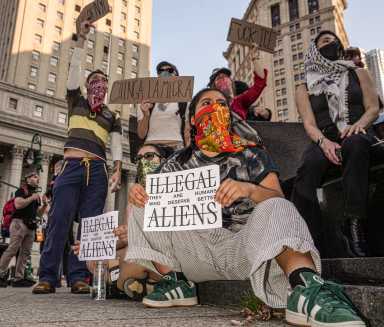 Protesters against ICE raids gather in Lower Manhattan