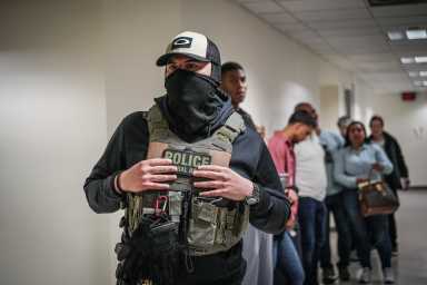 A masked-up federal agent at the ICE facility in Lower Manhattan on June 9, 2025.
