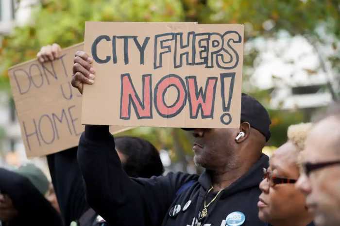 Appellate court directs Adams to implement CityFHEPS reforms, administration reviews further legal options 5 A man holds a sign at a rally that reads "CityFHEPS Now!"