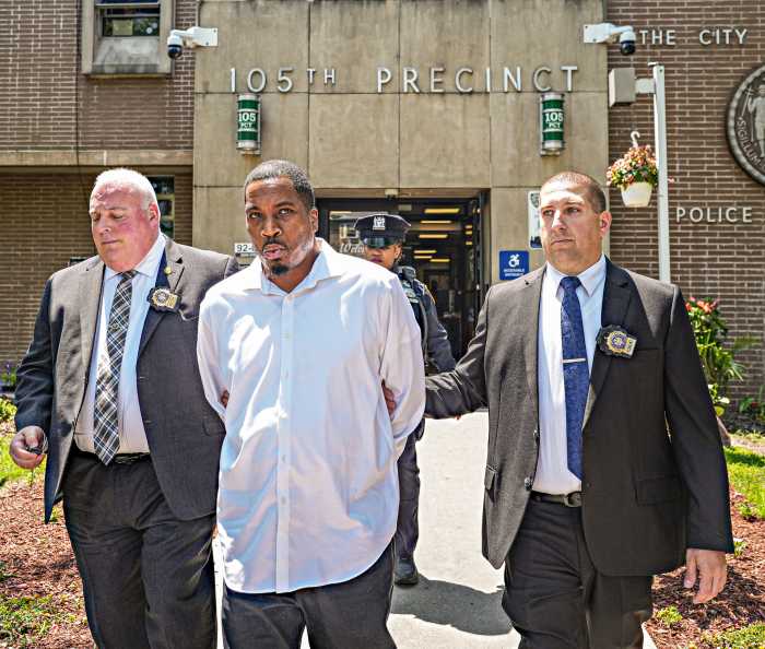 Alleged Queens hit-and-run driver turns himself for dragging victim over 1,000 feet to death in bloody getaway 2 Queens hit-and-run driver under arrest and escorted by detectives