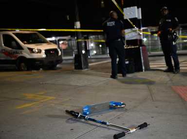 15-year-old boy shot while riding scooter in Brooklyn 20 Scooter on ground at scene in Brooklyn where boy was shot