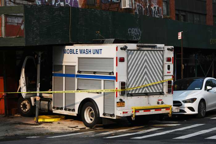 MTA wash truck crashes into apartment building in Brooklyn 3 white truck and building scaffolding