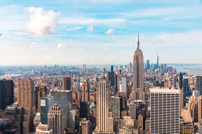 NYC Council to vote on Midtown South rezoning plan to build almost 10,000 homes 5 Iconic buildings overlooking bustling new york city with impressive architecture and vibrant energy in warm sunlight