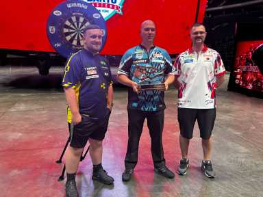 Dart Players from left to right: Luke Littler, Rob Cross, Damon Heta