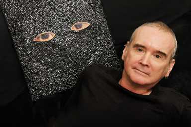 Artist Jimi Dams with sequin art