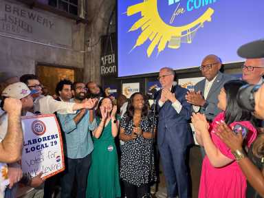 Mark Levine with supporters at comptroller primary win