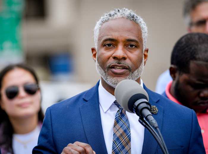 Op-ed | Early successes in Queens bus network redesign 3 Man with gray hair and beard speaking into microphone.