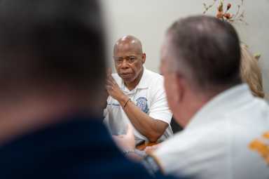 Mayor Eric Adams pictured visiting an off-duty federal law enforcement officer shot inside a Manhattan Park over the weekend