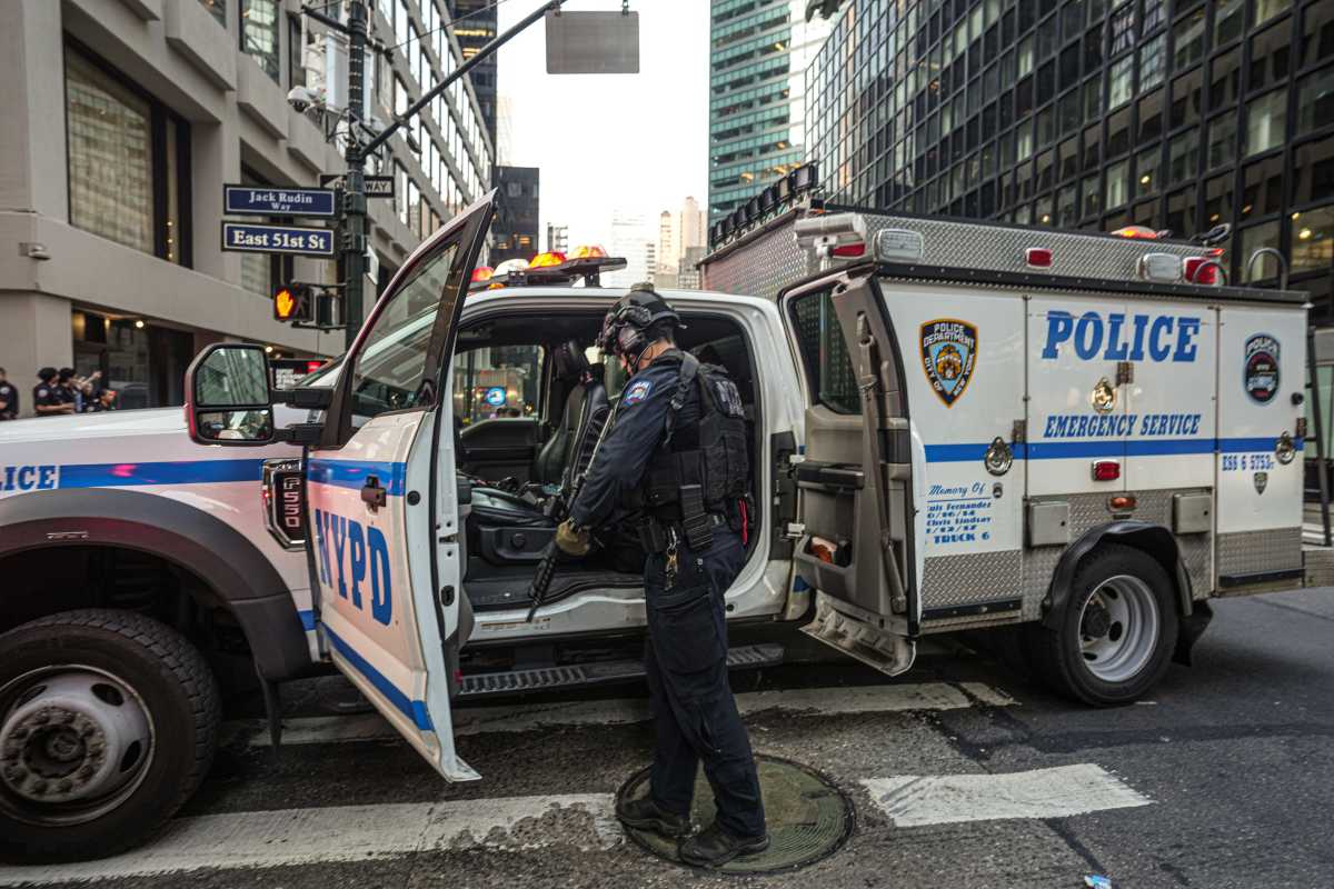 MIDTOWN MASS SHOOTING: SEIU security officer Aland Etienne among those murdered 1 Police at scene of Midtown mass shooting