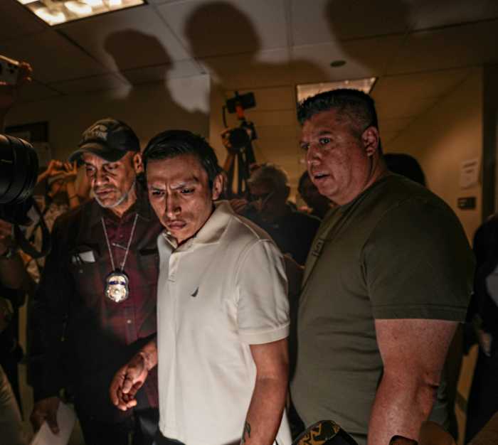 three men apprehended in dark ICE courtroom.