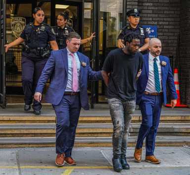 police perp walk suspect in MIdtown