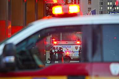 an ambulance and police at midtown shooting